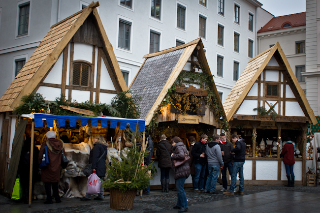 Medieval-style Christmas market at Wittelsbacherplatz in Munich. The stalls resemble half-timbered houses.