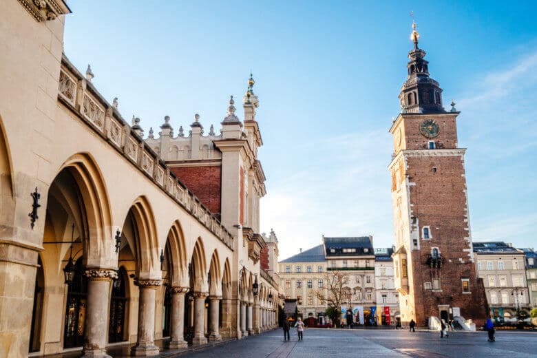Krakow's Main Square and Cloth Hall on a sunny day in December.