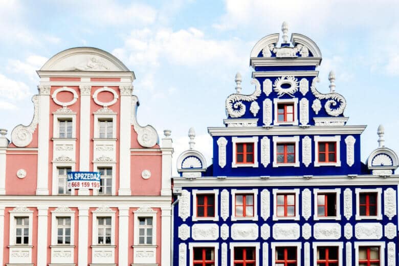 Pink and blue gabled buildings in the main square in Szczecin on the Polish border. 