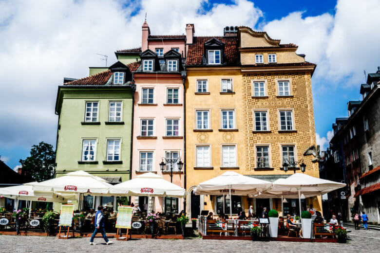 Green, pink and yellow facades in Old Town Warsaw.
