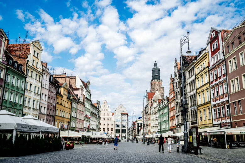 Main square with colourful buildings and cobblestone streets in Wroclaw Poland.
