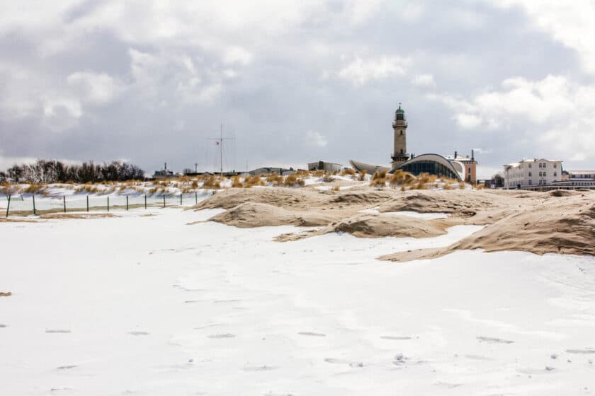 Snow covered sand at Warnemuende Beach near Rostock